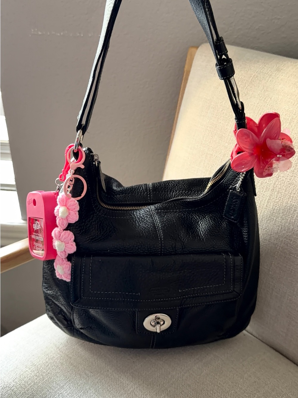 Coach Black Leather Shoulder Bag with Pink Floral Charms